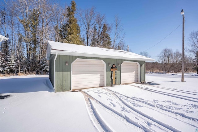 4463 E Singkofer, Superior, WI 54880 - snow covered garage featuring a garage