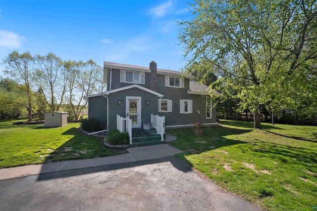 4463 E Singkofer, Superior, WI 54880 - view of front of house with a front lawn and a chimney