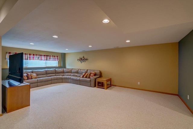 living area featuring carpet floors, baseboards, and recessed lighting