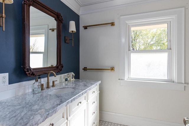 1337 Washington Ave, Oshkosh, WI 54901 - bathroom with vanity, a wealth of natural light, baseboards, and ornamental molding