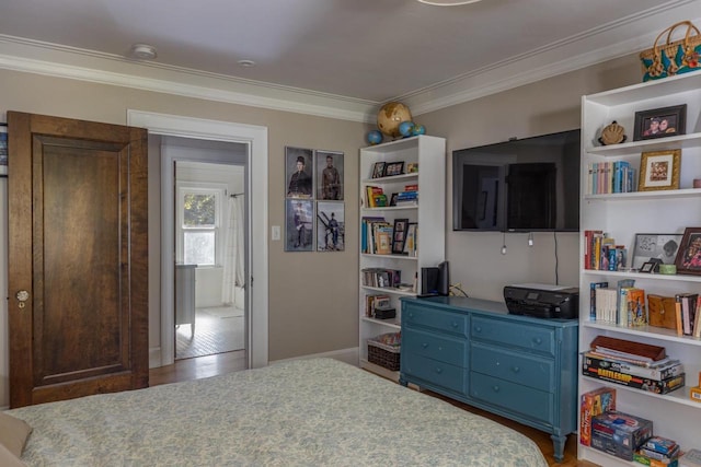 1337 Washington Ave, Oshkosh, WI 54901 - bedroom featuring wood finished floors and crown molding