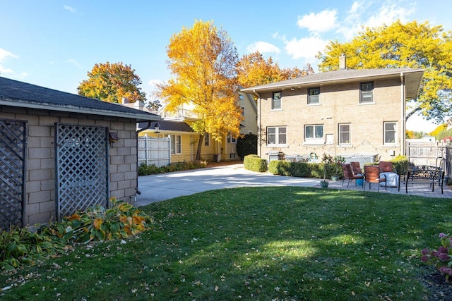 1337 Washington Ave, Oshkosh, WI 54901 - exterior space with a patio, fence, and a yard