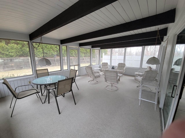 302 Riverview Ct, Portage, WI 53901 - sunroom / solarium with carpet flooring, outdoor dining space, and plenty of natural light
