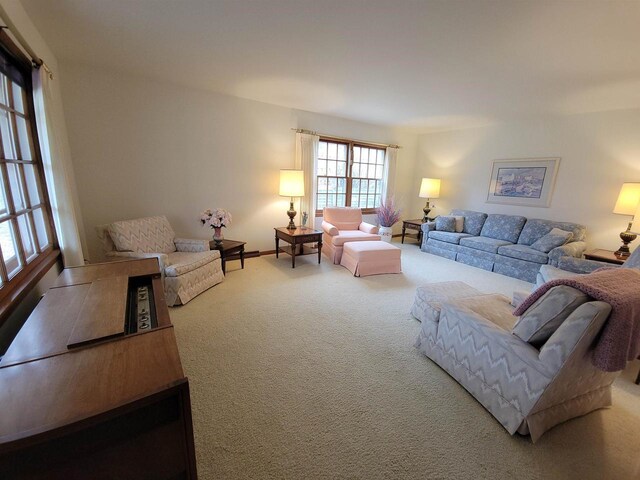 302 Riverview Ct, Portage, WI 53901 - carpeted living area with baseboards