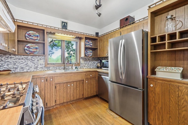 308 Forest St, Mount Horeb, WI 53572 - kitchen with open shelves, appliances with stainless steel finishes, a sink, and light countertops