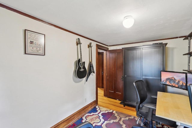 308 Forest St, Mount Horeb, WI 53572 - office area with wood finished floors, baseboards, and crown molding