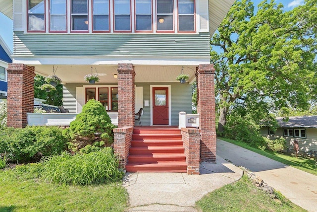 308 Forest St, Mount Horeb, WI 53572 - doorway to property featuring covered porch