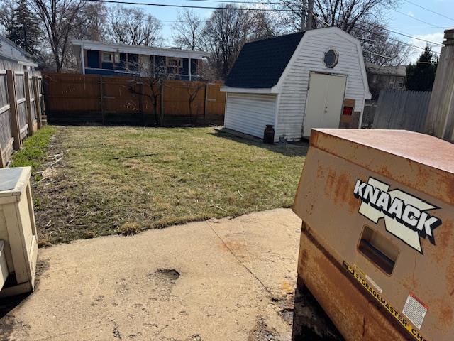 4273 W Beltline Hwy, Madison, WI 53711 - view of yard with an outbuilding, a fenced backyard, and a shed