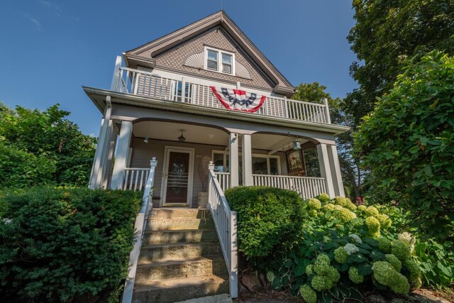 3720 County Highway Nn, West Bend, WI 53095 - view of front facade with a balcony and a porch