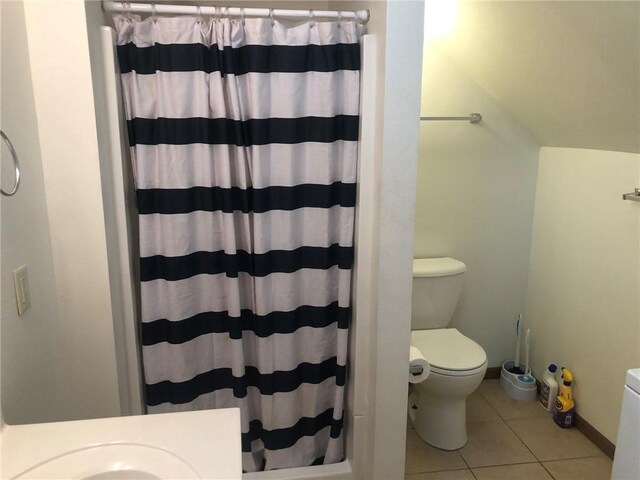 609 S Dewey St, Eau Claire, WI 54701 - bathroom with baseboards, toilet, tile patterned floors, and curtained shower