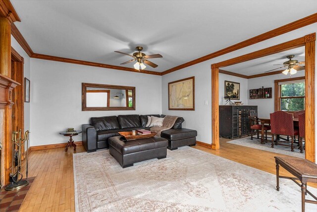 2346 Hickory Ln, Oshkosh, WI 54901 - living area with baseboards, a ceiling fan, and wood-type flooring