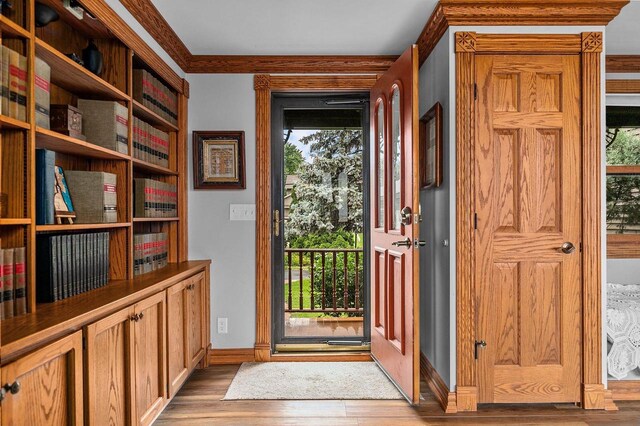 2346 Hickory Ln, Oshkosh, WI 54901 - doorway with baseboards and wood finished floors