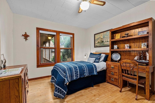 2346 Hickory Ln, Oshkosh, WI 54901 - bedroom with baseboards and light wood-type flooring