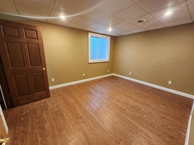 1579 Foxfire Ct, Waupaca, WI 54981 - interior space featuring visible vents, baseboards, a paneled ceiling, and wood finished floors