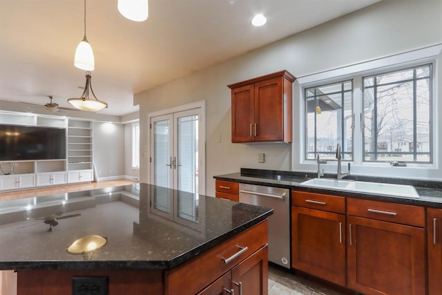 1579 Foxfire Ct, Waupaca, WI 54981 - kitchen with pendant lighting, dark stone counters, stainless steel dishwasher, a sink, and french doors