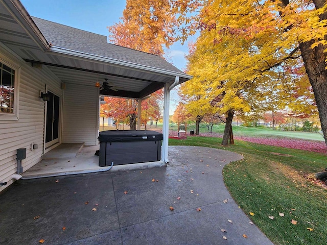 1579 Foxfire Ct, Waupaca, WI 54981 - view of patio / terrace with a ceiling fan and a hot tub