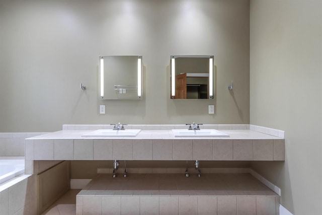1579 Foxfire Ct, Waupaca, WI 54981 - full bathroom with double vanity, a sink, and tiled bath