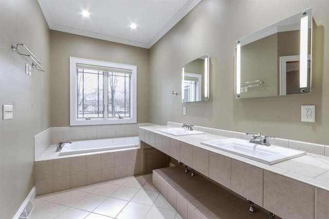 1579 Foxfire Ct, Waupaca, WI 54981 - bathroom with tile patterned floors, a garden tub, a sink, and ornamental molding