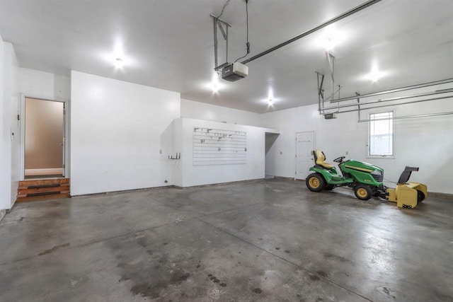 1579 Foxfire Ct, Waupaca, WI 54981 - garage featuring a garage door opener