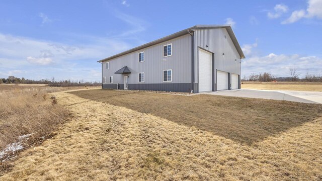 view of property exterior with driveway