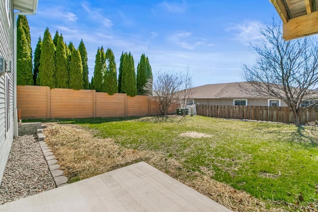 view of yard featuring a fenced backyard