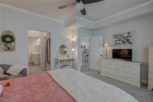 102 Linden Ave, Hudson, WI 54016 - bedroom featuring ensuite bathroom, ornamental molding, a ceiling fan, and light colored carpet