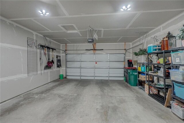 102 Linden Ave, Hudson, WI 54016 - garage with a garage door opener