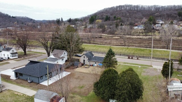 birds eye view of property featuring a mountain view
