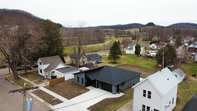 bird's eye view with a mountain view and a residential view
