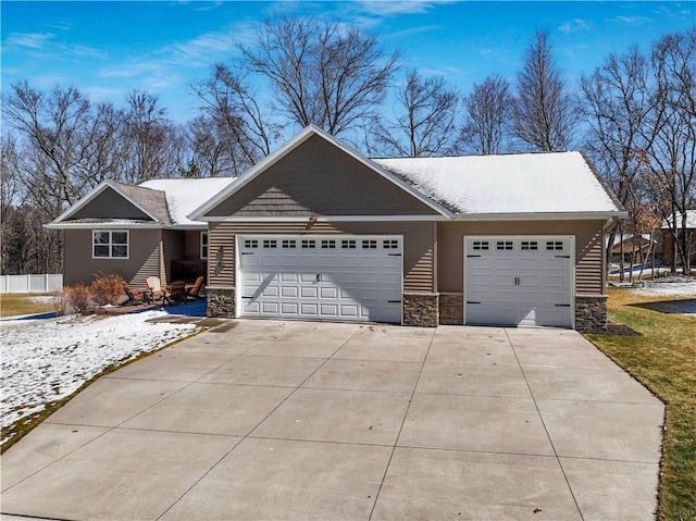 820 Rusty Ct, Altoona, WI 54720 - single story home featuring stone siding, concrete driveway, and an attached garage