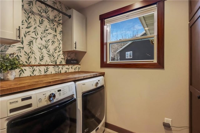 820 Rusty Ct, Altoona, WI 54720 - laundry area featuring cabinet space, separate washer and dryer, and baseboards