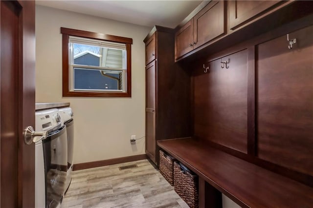 820 Rusty Ct, Altoona, WI 54720 - mudroom with separate washer and dryer, light wood-style flooring, and baseboards