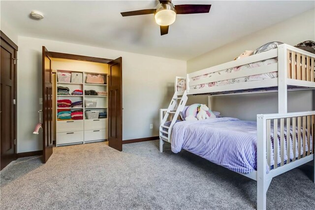 820 Rusty Ct, Altoona, WI 54720 - carpeted bedroom featuring ceiling fan, baseboards, and a closet