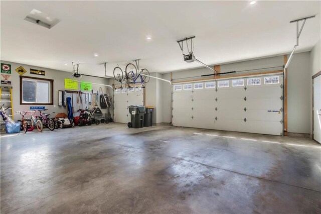 820 Rusty Ct, Altoona, WI 54720 - garage with a garage door opener and recessed lighting