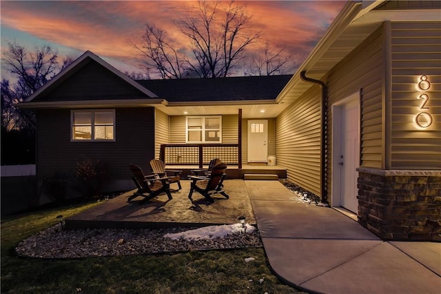 820 Rusty Ct, Altoona, WI 54720 - view of patio featuring a fire pit and covered porch