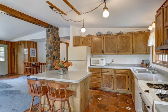 W5854 Bubbling Springs Dr, Elkhorn, WI 53121 - kitchen with a sink, vaulted ceiling with beams, white appliances, and a healthy amount of sunlight