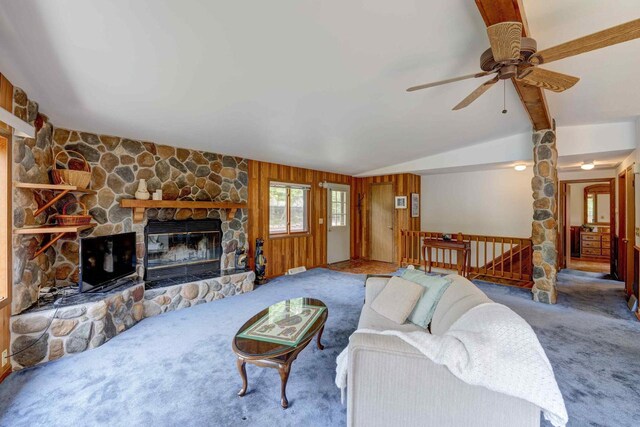 W5854 Bubbling Springs Dr, Elkhorn, WI 53121 - living area with carpet flooring, ceiling fan, a stone fireplace, and lofted ceiling