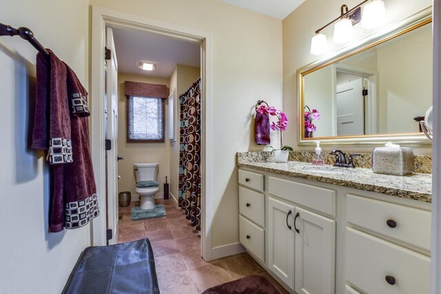 6679 S Chickahauk Trl, Middleton, WI 53562 - full bath with toilet, vanity, and baseboards