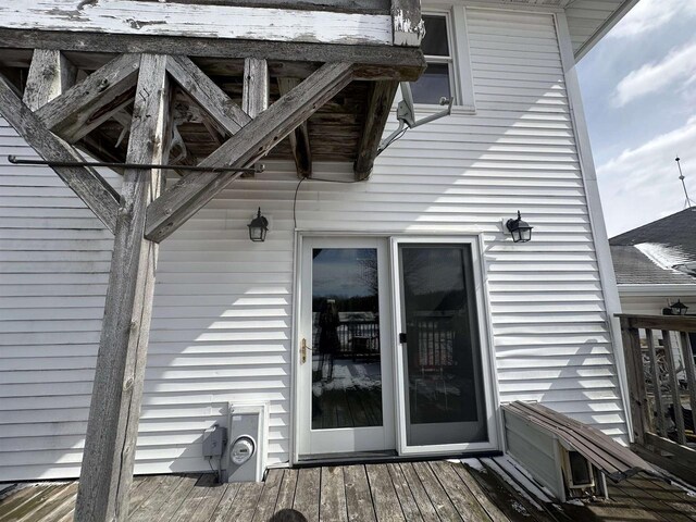 7533 N Evergreen Dr, Algoma, WI 54201 - doorway to property featuring a wooden deck