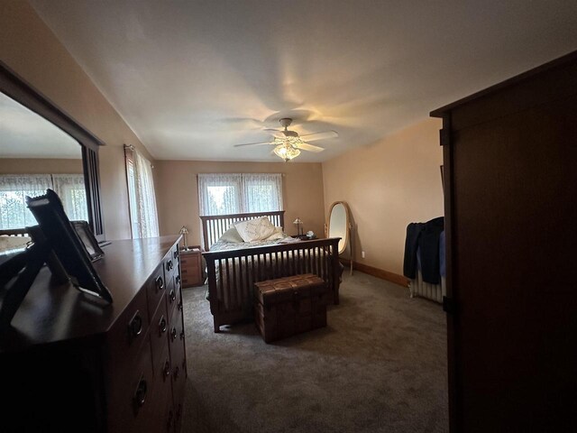 7533 N Evergreen Dr, Algoma, WI 54201 - carpeted bedroom with baseboards and ceiling fan