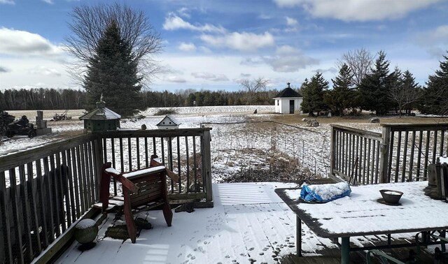 7533 N Evergreen Dr, Algoma, WI 54201 - snow covered deck with an outdoor structure and a shed