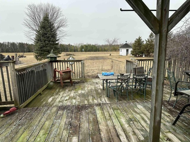 7533 N Evergreen Dr, Algoma, WI 54201 - wooden terrace with outdoor dining area