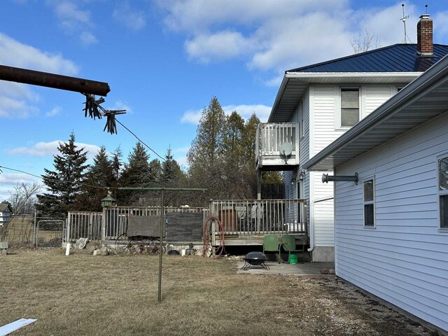 7533 N Evergreen Dr, Algoma, WI 54201 - view of yard with a wooden deck, a gate, a balcony, and fence