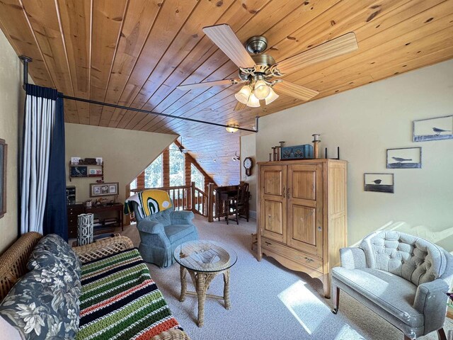 7118 Timber Ln, Rhinelander, WI 54501 - living area with wooden ceiling, light carpet, and ceiling fan