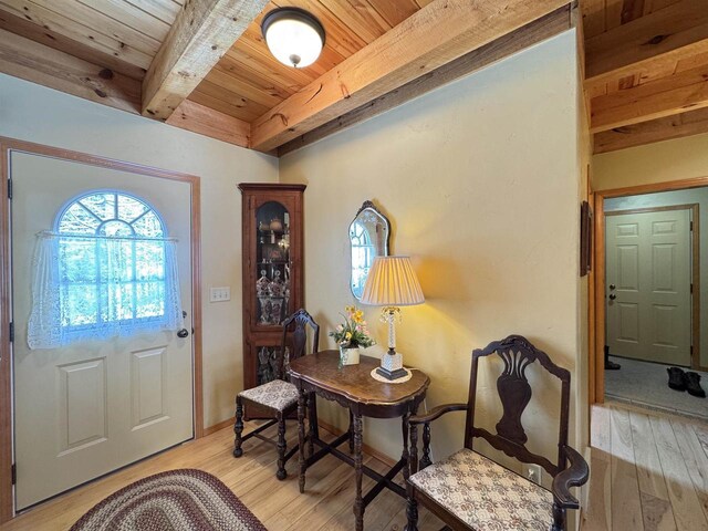 7118 Timber Ln, Rhinelander, WI 54501 - foyer with wood ceiling, beam ceiling, and light wood-style floors