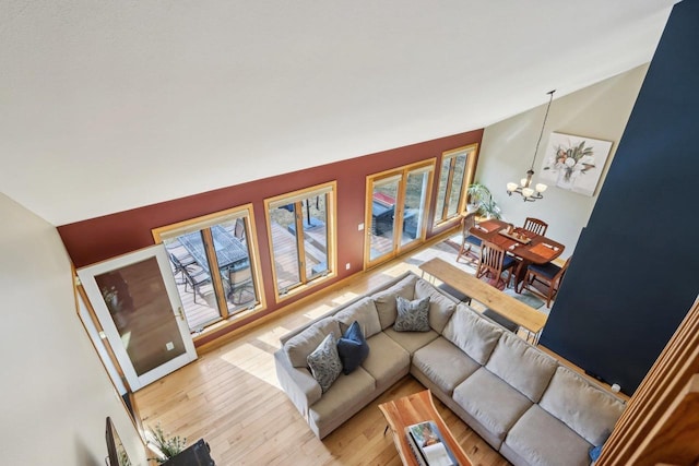 119 Vilas Hibbard Pkwy, Lodi, WI 53555 - living room featuring a chandelier and light wood finished floors