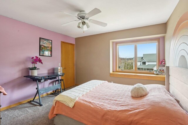 119 Vilas Hibbard Pkwy, Lodi, WI 53555 - bedroom with baseboards, carpet flooring, and a ceiling fan