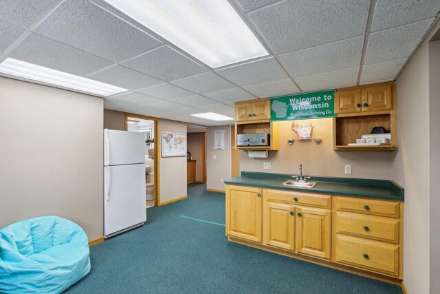 119 Vilas Hibbard Pkwy, Lodi, WI 53555 - kitchen with open shelves, a sink, dark countertops, dark carpet, and freestanding refrigerator