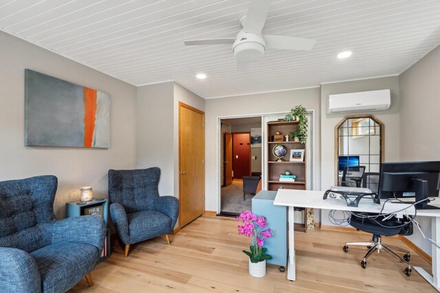 119 Vilas Hibbard Pkwy, Lodi, WI 53555 - home office with a wall mounted air conditioner, ceiling fan, baseboards, and light wood-style floors