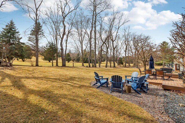 119 Vilas Hibbard Pkwy, Lodi, WI 53555 - view of yard featuring an outdoor fire pit and a deck